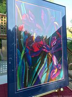 Framed floral print showing full artwork with frame, mat and glass