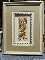 Full view of framed dried floral shadow box