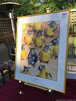 Front view of framed koala print on easel