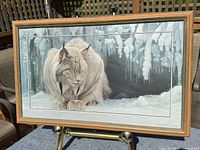 Framed Winter Lynx print on easel full view