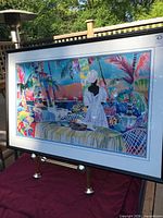 Front view of framed print showing artwork and frame details