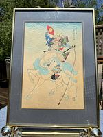 Full view of framed woodblock print