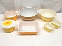 Group shot of all six Pyrex pieces with lids displayed