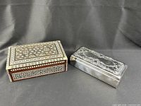 Both jewellery boxes closed, showing size and exterior materials