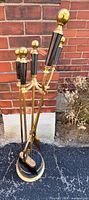 fireplace tool set assembled on stand