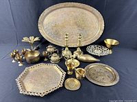 All 22 brass pieces grouped to show variety and scale