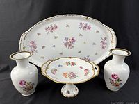 All four porcelain pieces front view
