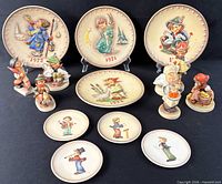 Front view of all 14 Goebel Hummel items