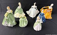 All seven Royal Doulton figurines front view