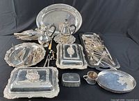 Full lot overview showing trays, covered dishes, teapot, flatware
