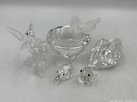 Group view of all five Swarovski crystal bird figures