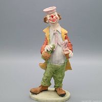 Full view of clown figurine on base