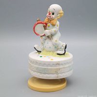 Front view of ceramic clown music box