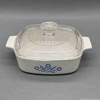 Front view showing blue Cornflower motif and glass lid