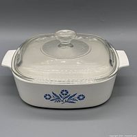 Angled view of casserole showing Blue Cornflower graphic and lid