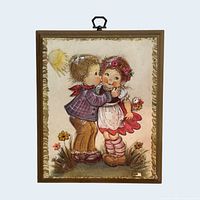 Front view of plaque showing full artwork and frame