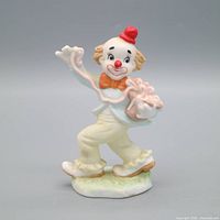 Front view of clown figurine showing colours and posture