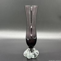 Full view of vase, showing amethyst body and clear teardrop foot