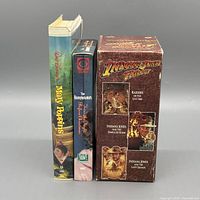 Spine view of three VHS items
