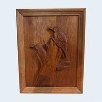 Full view of framed wood relief carving plaque