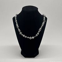 Full view of necklace on display bust