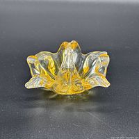 Top view showing ruffled rim and amber swirls