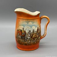 Front view showing transfer print, color gradient, spout and handle