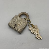 front of Master padlock with keys attached
