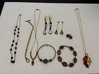 Full layout showing all bracelets, necklaces and earrings