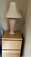 Full view of lamp on table with shade attached