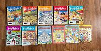 All eleven publications laid out showing covers