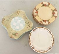 Three pattern groups of plates showing shapes and designs