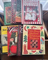 Stacked view of all five Christmas craft books