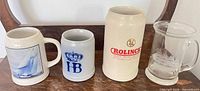 Four drinkware items on shelf
