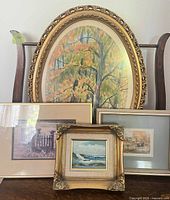 Group view of all four framed artworks