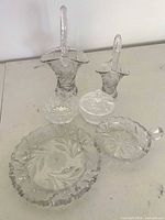 All six clear cut glass pieces grouped