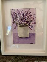 Framed watercolour of purple flowers in pot