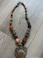 Full view of beaded necklace laid flat