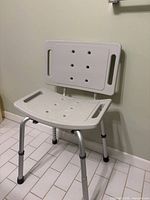 front view of adjustable shower chair
