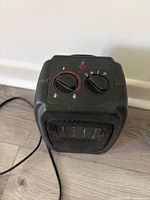 Top-down view of Honeywell space heater showing control dials and grille