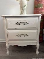 French-provincial style two-drawer white nightstand