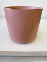 Front view of dusty pink ceramic plant pot