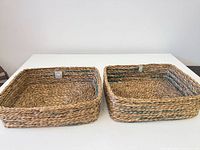 Both rectangular seagrass baskets side by side