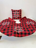 Tree skirt laid flat with pillow displayed