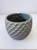 Full view of planter showing shape, texture, color