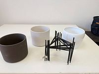 All three planters with stacked metal stands