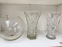 All three vases side by side on shelf