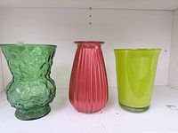 Full view of the three glass vases side by side