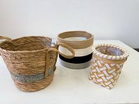 Three baskets grouped showing shapes, colors, materials