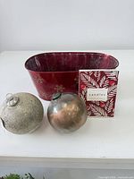 Planter, two ornaments and boxed candles overview
